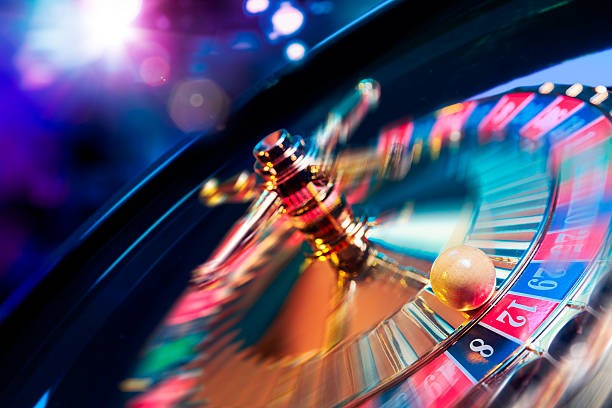 Live dealer preparing cards for next Speed Baccarat round